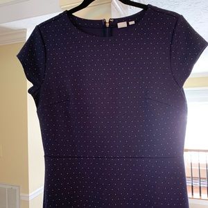 Navy polka dot dress with flaired bottom